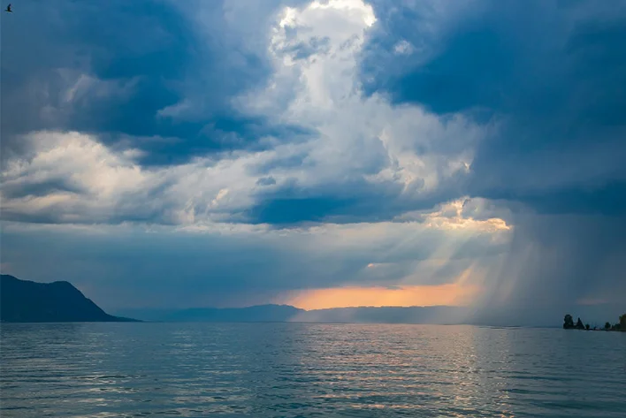 Body of Water Under Cloudy Sky in Montreux Switzerland