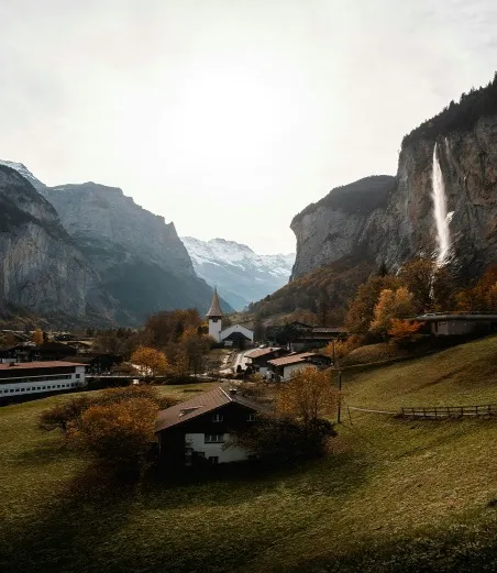 Staubbach Falls flowing over the village of Lauterbrunnen